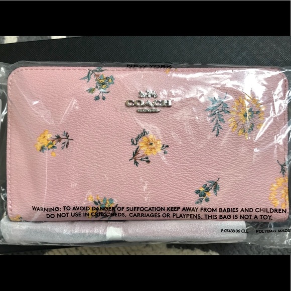 Coach Handbags - NWT COACH || LARGE PHONE WALLET PINK PRINT